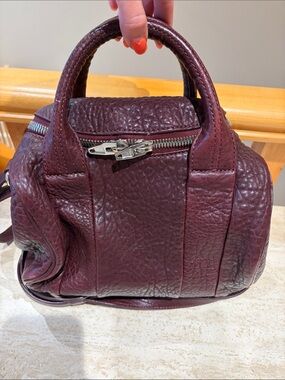 Alexander Wang Rocco Duffle Bag in a burgundy pebbled leather finish